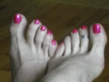 Sissy nail salon pedi with fuchsia polished toes!