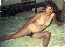 Posing In the Martial Bed Where She Cucks Her Sissy Husband.jpg