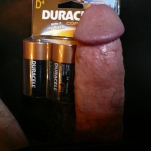 D batteries (for scale) next to Randy's cock